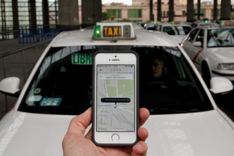 MADRID, SPAIN - OCTOBER 14:  In this photo illustration the new smart phone taxi app 'Uber' shows how to select a pick up location at Atocha Station on October 14, 2014 in Madrid, Spain. 'Uber' application started to operate in Madrid last September despite Taxi drivers claim it is an illegal activity and its drivers currently operate without a license. 'Uber' is an American based company which is quickly expanding to some of the main cities from around the world.  (Photo by Pablo Blazquez Dominguez/Getty Images)